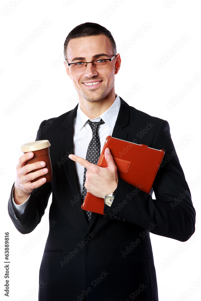 businessman holding cup of coffee and tablet computer businessman holding cup of coffee and tablet computer