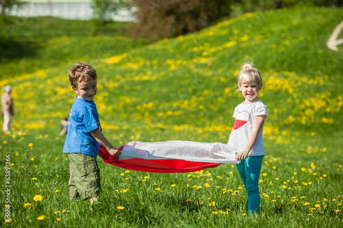 Obraz na płótnie children with Polish flag w salonie
