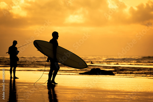 Photography surfer silhouette during sunset