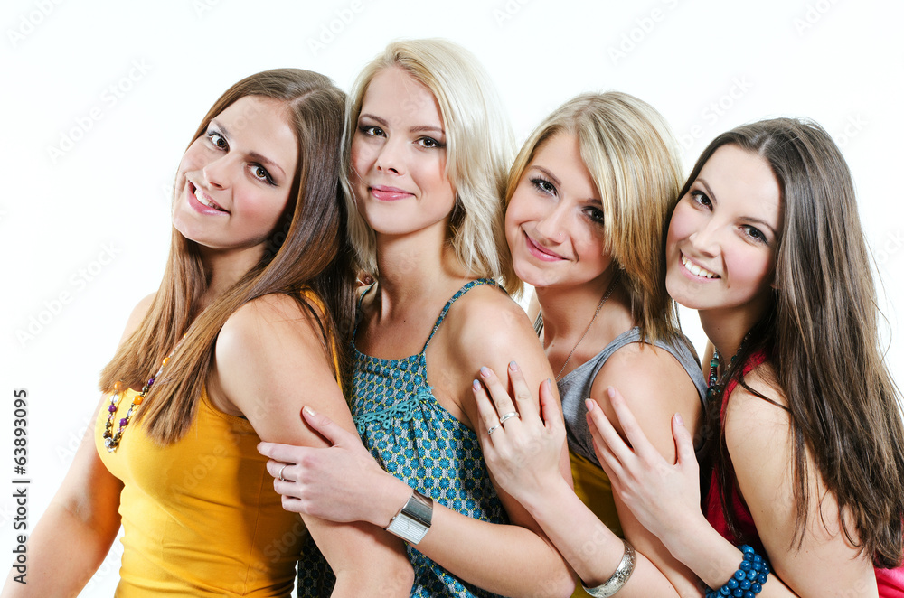 Four beautiful young girls in colorful T-shirts Four beautiful young girls in colorful T-shirts