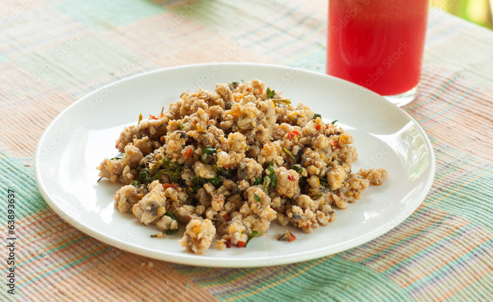 Thai spicy food , fried fish with sweet basil