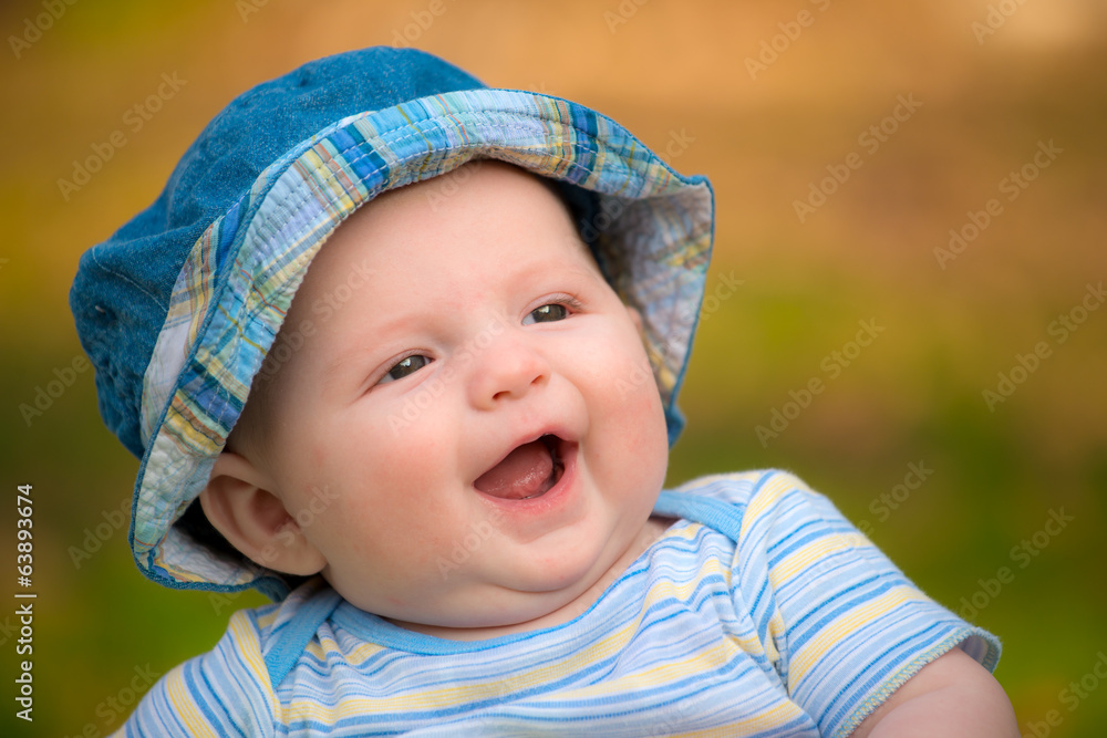 Outdoor portrait of happy smiling infant baby boy Outdoor portrait of happy smiling infant baby boy