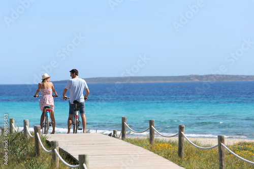 Photos Couple riding bikes on Formentera Island