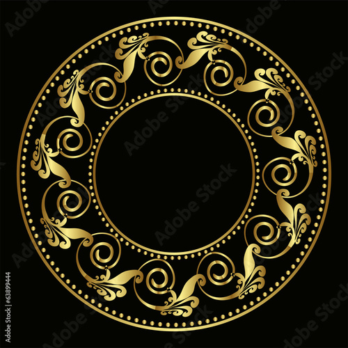 Golden plate with vintage ornament on black background