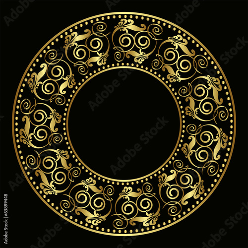 Golden plate with vintage ornament on black background