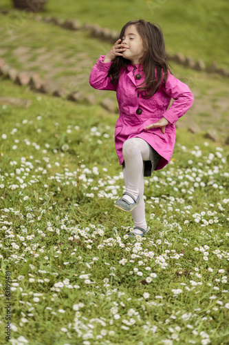 Little girl at the spring f...