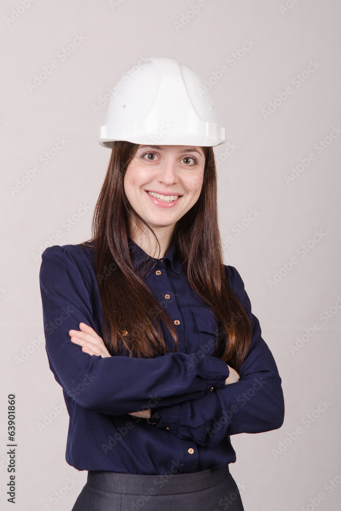 Portrait of a girl engineer in helmet Portrait of a girl engineer in helmet