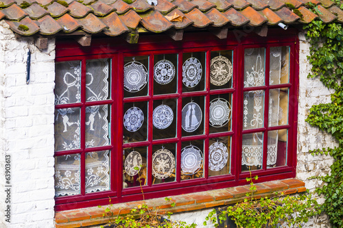 lacemakers window display, Bruges, Belgium