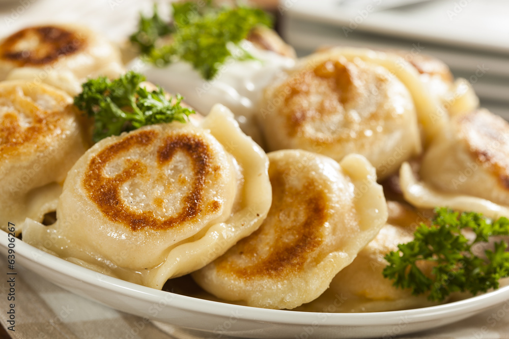 Homemade Polish Pierogis with Sour Cream Homemade Polish Pierogis with Sour Cream