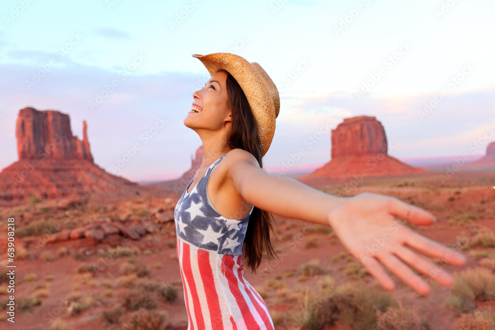 Cowgirl - woman happy and free in Monument Valley