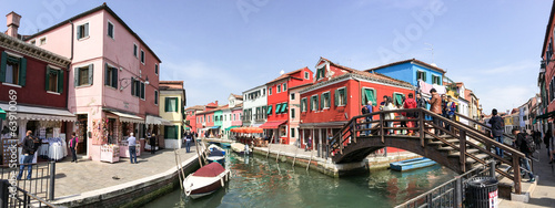 BURANO, ITALY - MAR 19, 2014: Colourful homes of the small city.