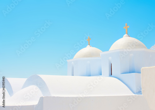 2 Beautiful old white twin churches in Amorgos island in Greece
