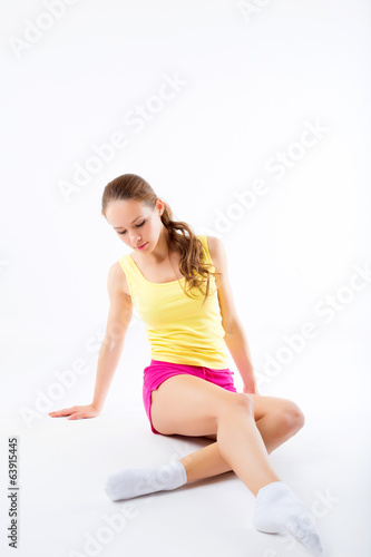 legs slender fitness girl - isolated on white background