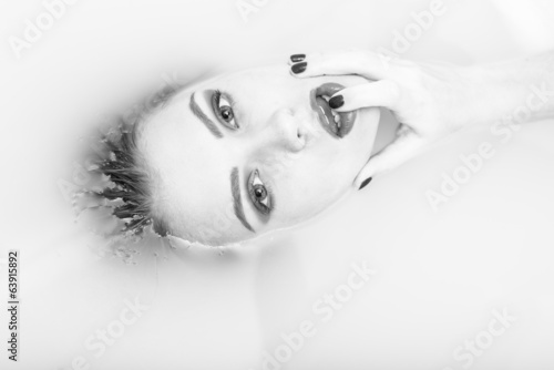 Fotografie Woman in milk bath