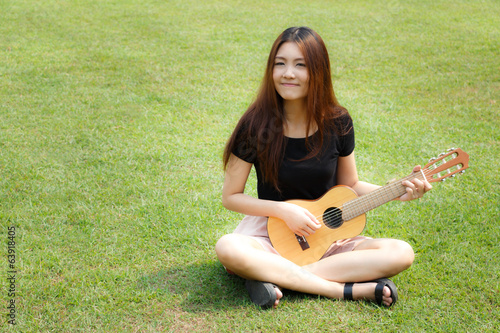 Girl playing guitar