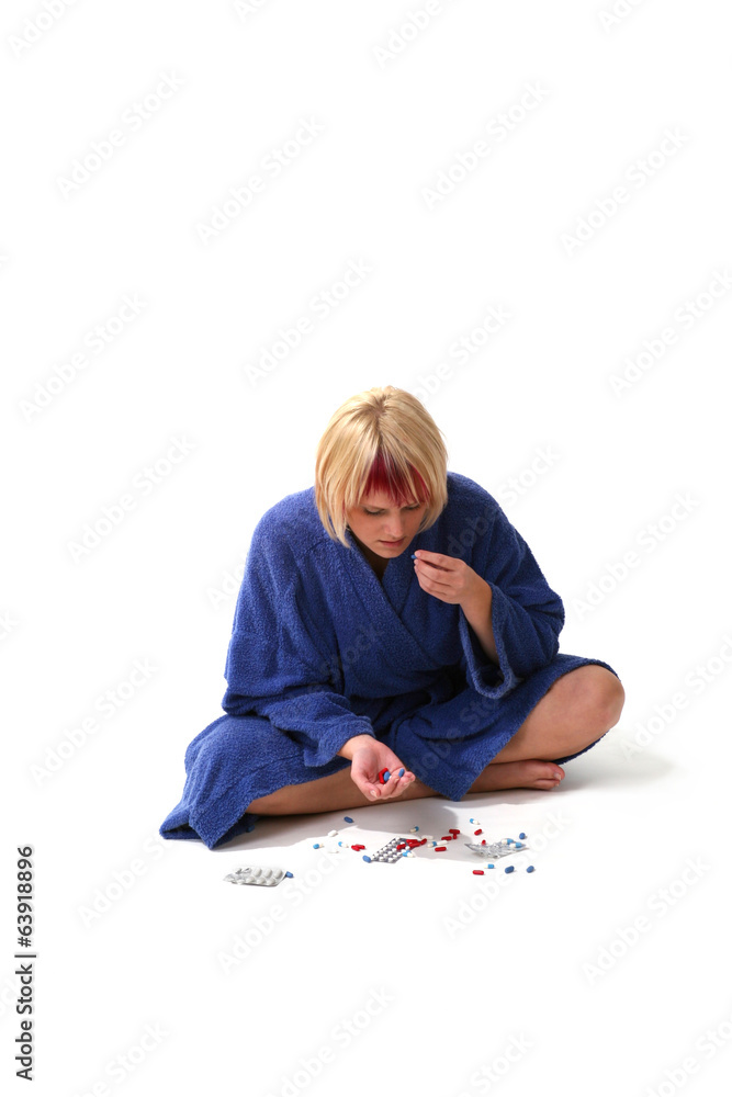 Sick girl in housecoat with a cup of tea Sick girl in housecoat with a cup of tea