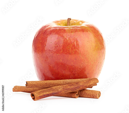 Red apple and cinnamon sticks