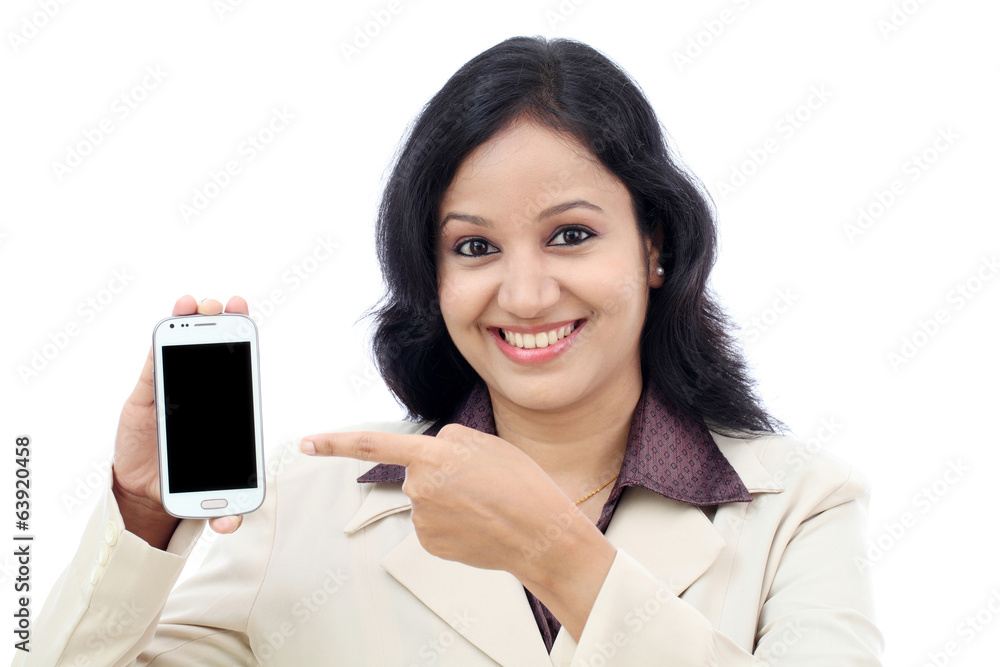 Young business woman showing black display of mobile phone Young business woman showing black display of mobile phone