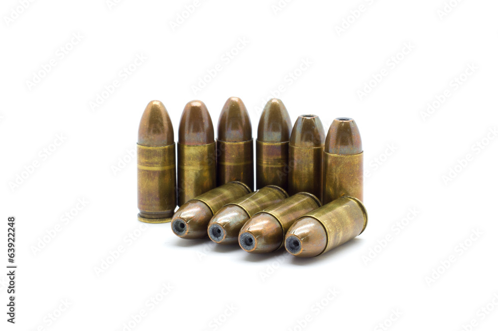9mm bullet isolated on white background 9mm bullet isolated on white background