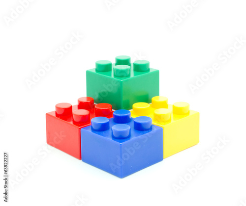 Plastic building blocks on white background