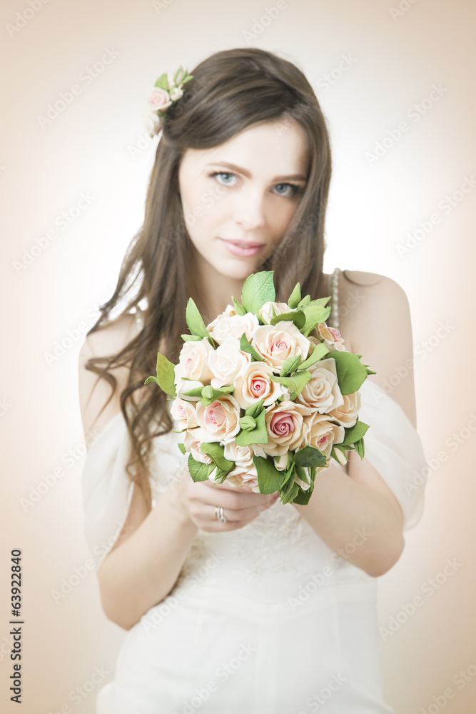 Beautiful bride with wedding bouquet