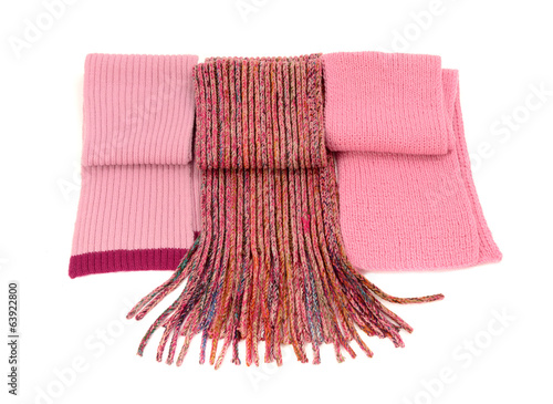 Three cute pink winter scarves. Wool scarves isolated on white.