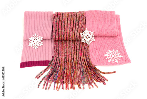 Three cute pink winter scarves with snowflakes. Isolated 