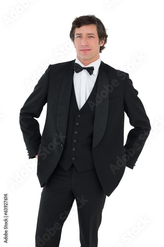 Portrait of groom on white background