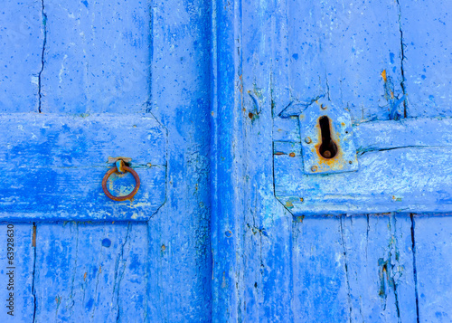 Detail of a blue wooden door in Amorgos island in Greece
