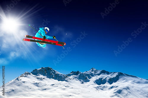 ski in blue sky