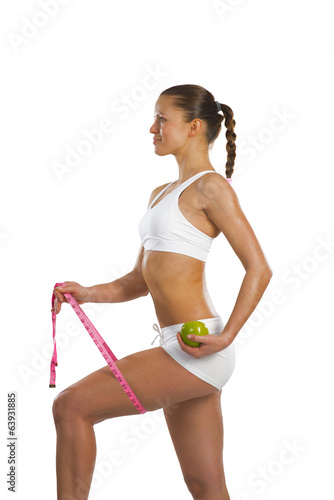 young attractive woman with measuring tape
