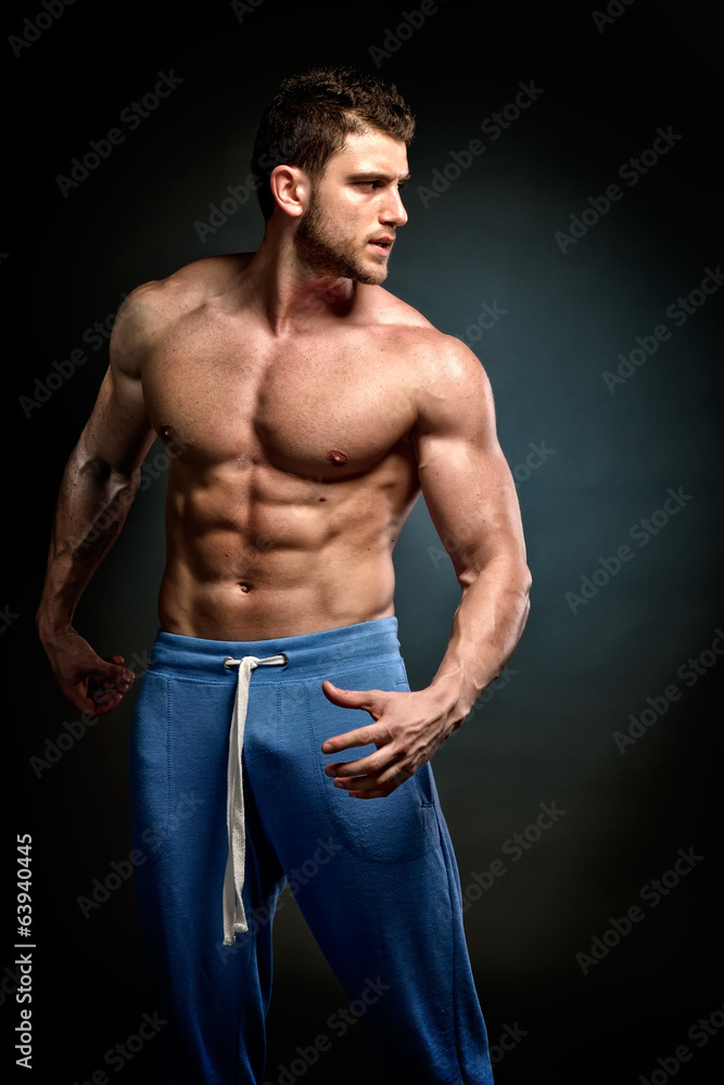 Fototapeta premium athletic young man exercising