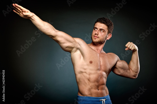 athletic young man exercising