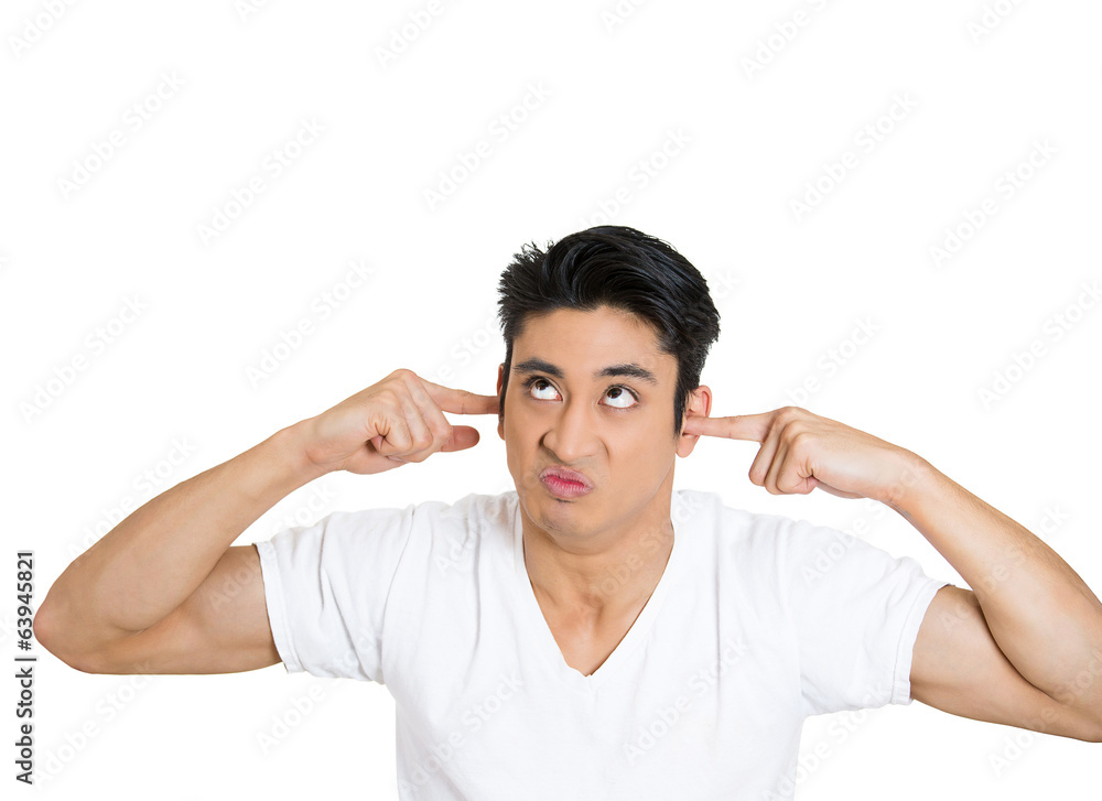 Loud noise. Man covering ears doesn't want to hear you Loud noise. Man covering ears doesn't want to hear you