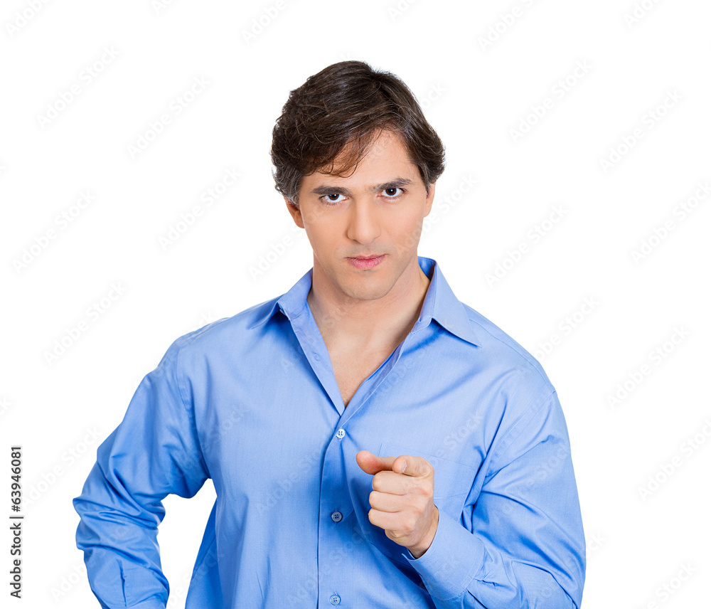 Serious man pointing finger at you camera, white background Serious man pointing finger at you camera, white background