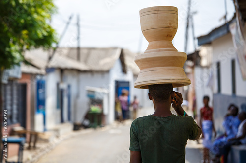 African woman carry things on her head