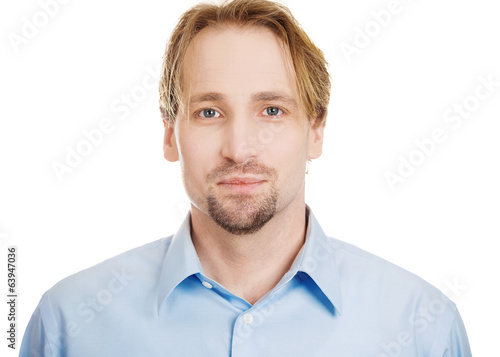 Serious man. Headshot young handsome man on white background 