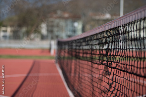 Tennis Court Net and Court Beyond © Jale Ibrak