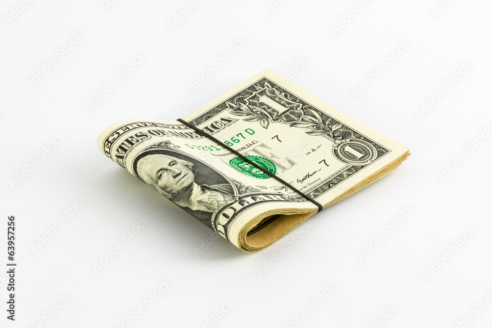 One dollar banknotes rolled up with rubberband.