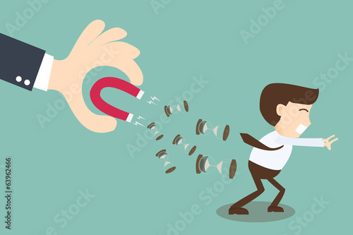 Boss hand holding magnet attracting time businessman