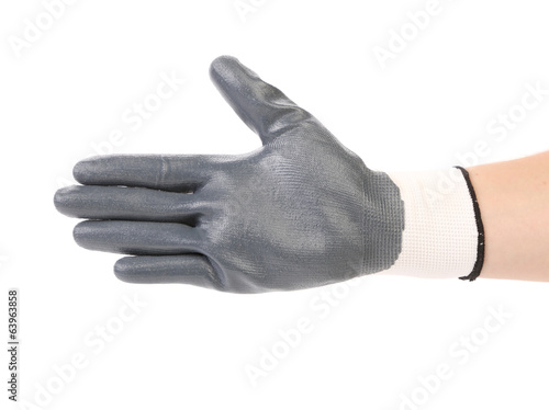 Hand in black rubber glove.