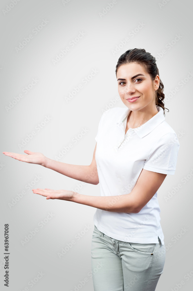 Portrait of female worker showing blank area for sign Portrait of female worker showing blank area for sign