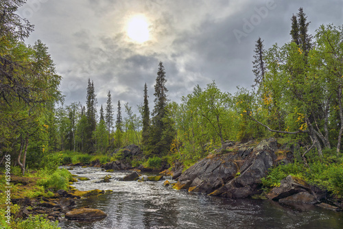 Mystical landscape on the river Polisarke. Kola Peninsula.
