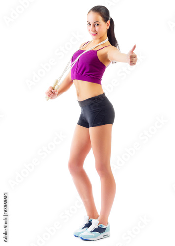Sporty girl with skipping rope