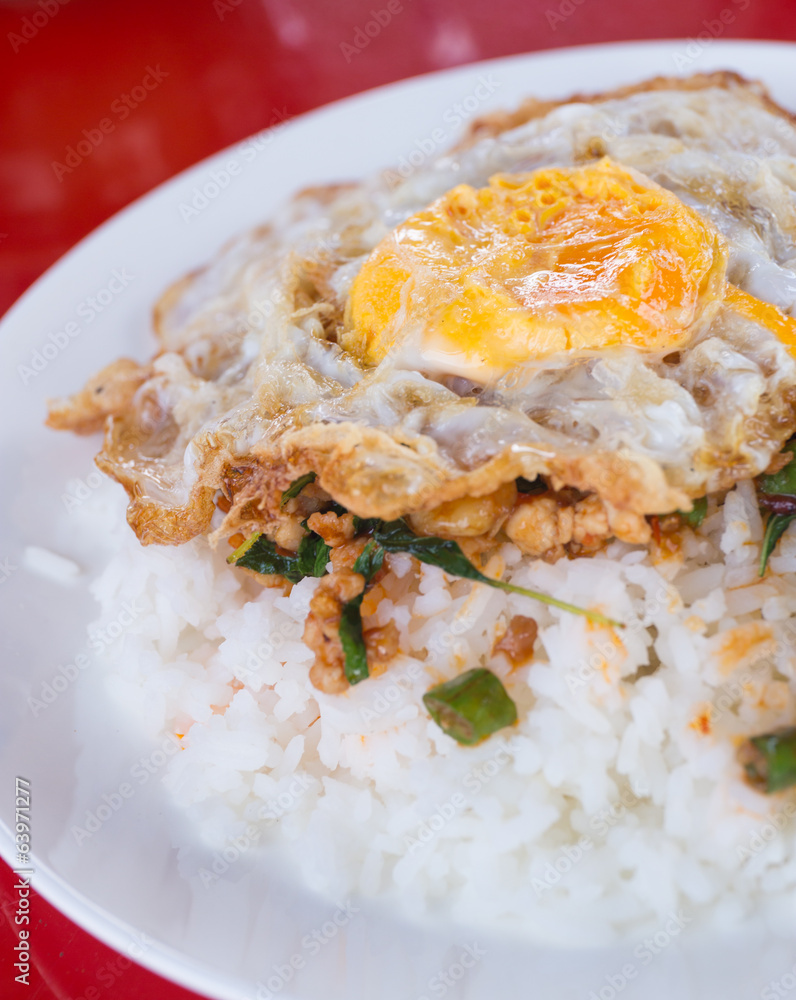 fried basil chicken with fried egg and rice fried basil chicken with fried egg and rice