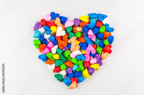 colorful origami heart on white background