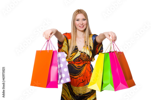Young woman after shopping isolated on the white