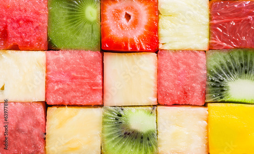 Background texture of diced tropical summer fruit