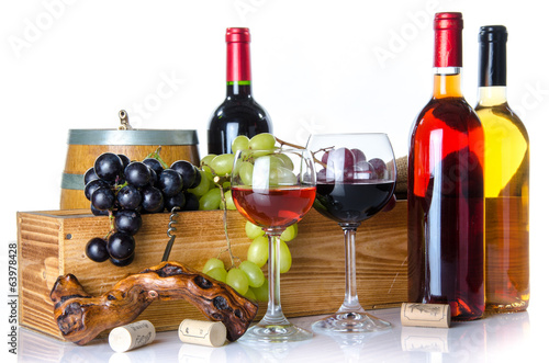 Fototapeta Naklejka Na Ścianę i Meble -  Composition with glasses and bottles of wine, a cask, corks, a c