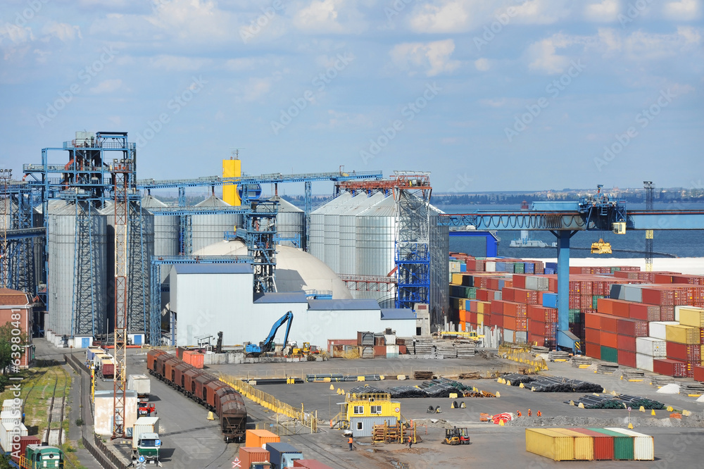 Grain dryer, train and scrap metal in the port Grain dryer, train and scrap metal in the port